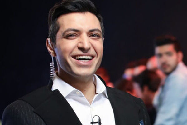 سورپرایز اشکان خطیبی برای پسرک شمع فروش مشهدی! +عکس