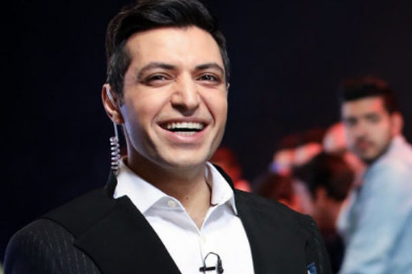 سورپرایز اشکان خطیبی برای پسرک شمع فروش مشهدی! +عکس